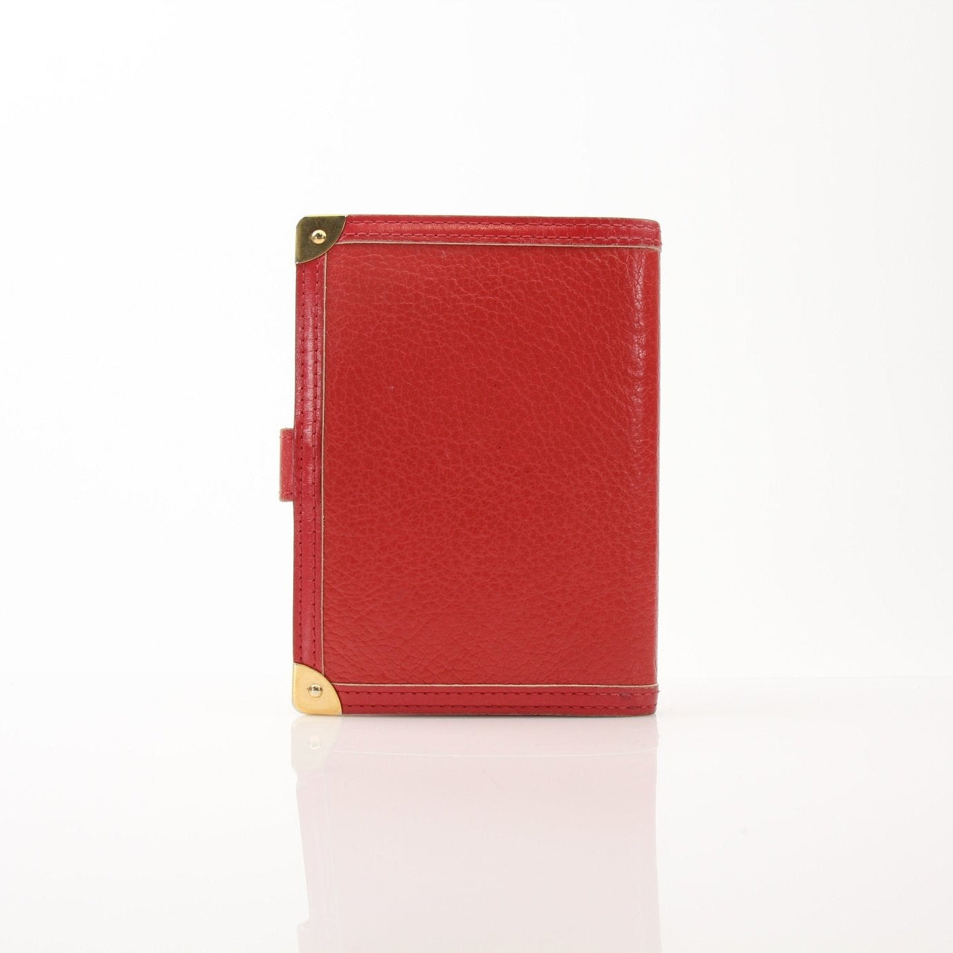 Louis Vuitton Suhali Le Fabuleux Red Agenda PM compact planner cover with gold hardware and leather details.