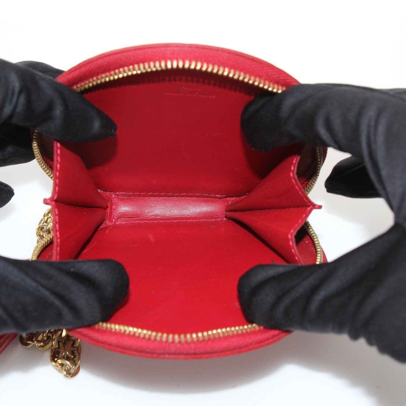 Louis Vuitton Limited Edition Bell Boy coin purse wallet by Gold & Beyond, featuring detailed design and compact size.