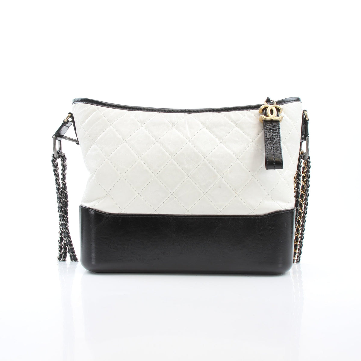 White Chanel Gabrielle Medium Hobo Bag with leather, featuring gold-tone hardware, stylish and spacious handbag for daily use.