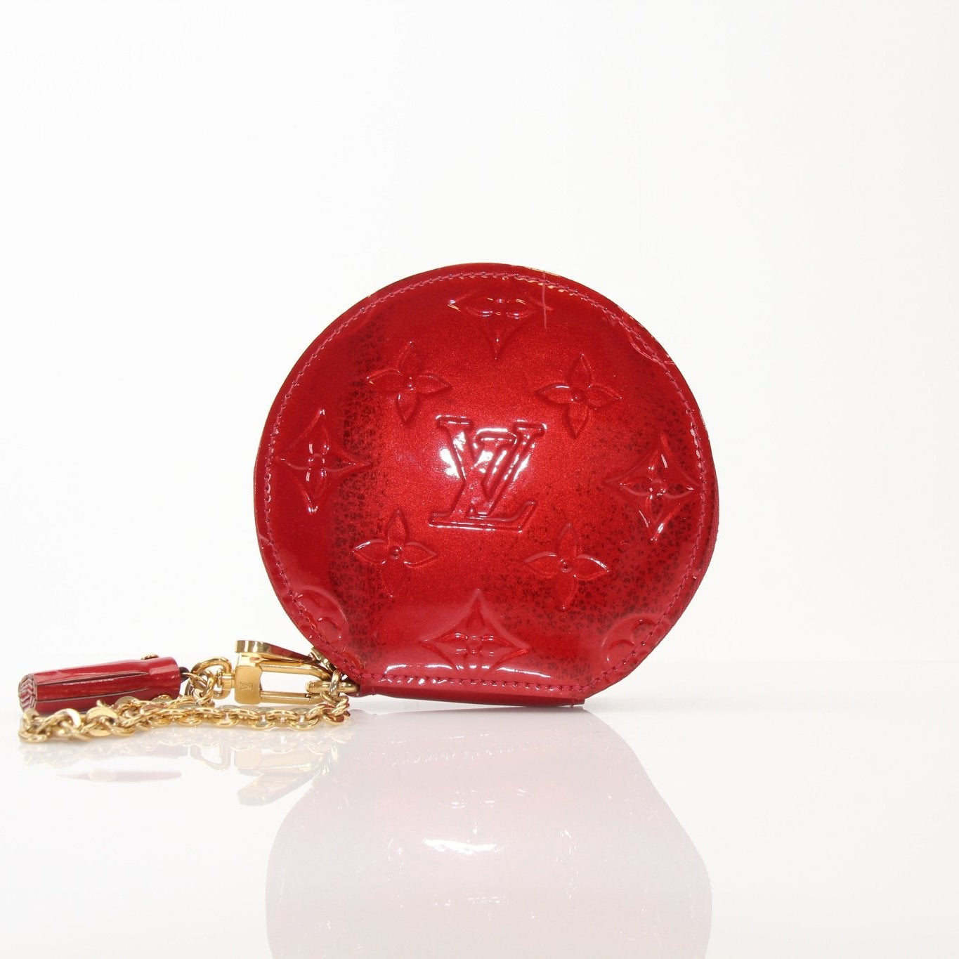 Louis Vuitton Limited Edition Bell Boy coin purse wallet by Gold & Beyond, featuring detailed design and compact size.