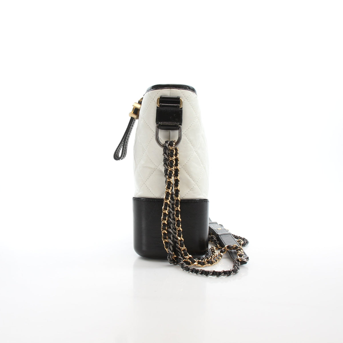 White leather Chanel Gabrielle Medium Hobo Bag with gold-tone hardware, featuring a soft, slouchy handbag design.