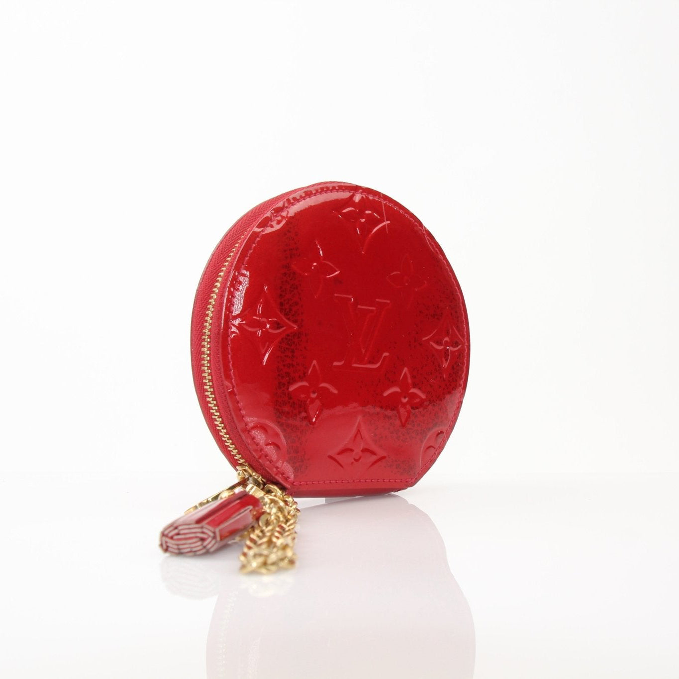 Louis Vuitton Limited Edition Bell Boy coin purse wallet by Gold & Beyond, featuring detailed design and compact size.