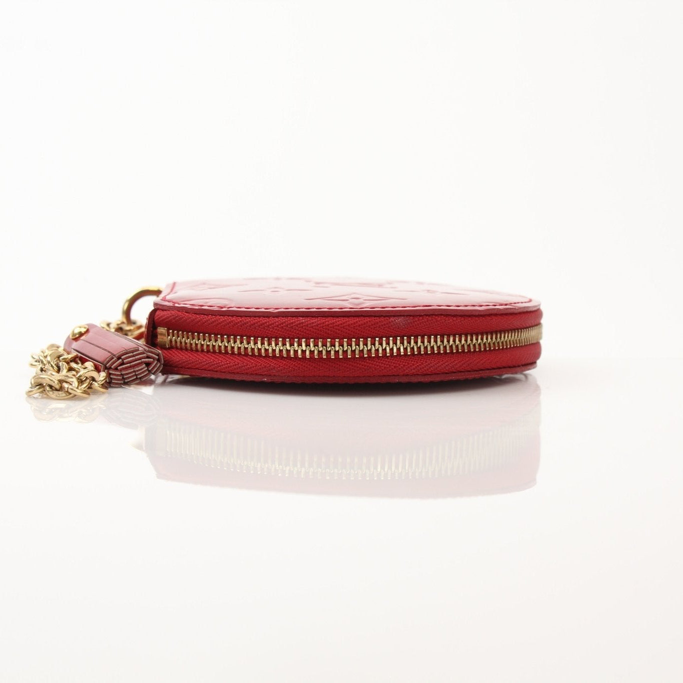 Louis Vuitton Limited Edition Bell Boy coin purse wallet by Gold & Beyond, featuring detailed design and compact size.