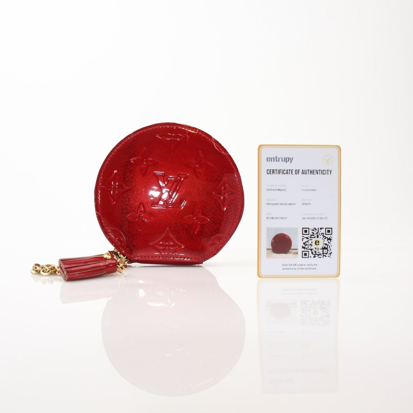 Louis Vuitton Limited Edition Bell Boy coin purse wallet by Gold & Beyond, featuring detailed design and compact size.