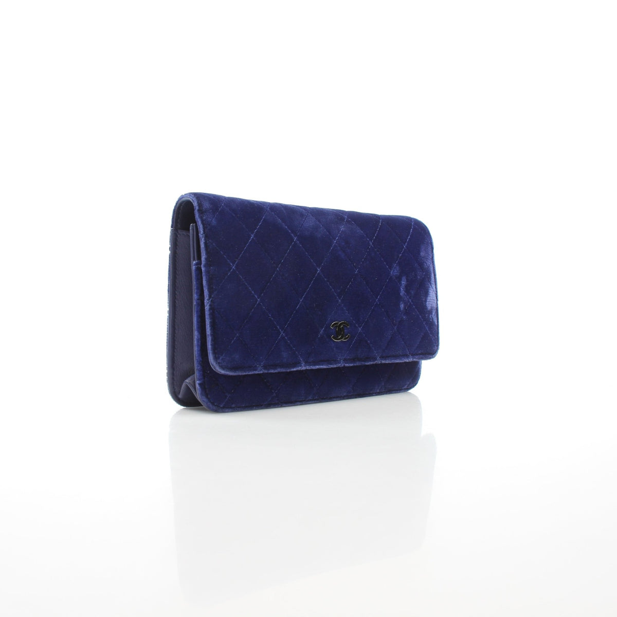 Chanel Classic Velvet Wallet on Chain in blue with gold hardware, featuring quilted velvet material and chain strap.