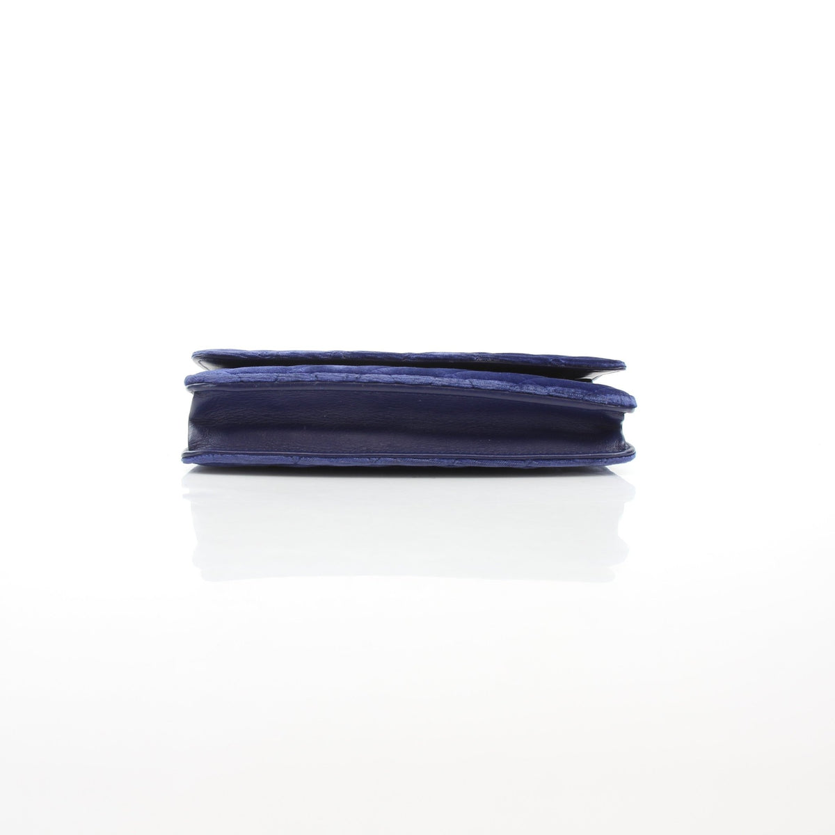 Blue Chanel Classic Velvet Wallet on Chain with gold chain and logo, featuring a luxurious velvet exterior and compact design.
