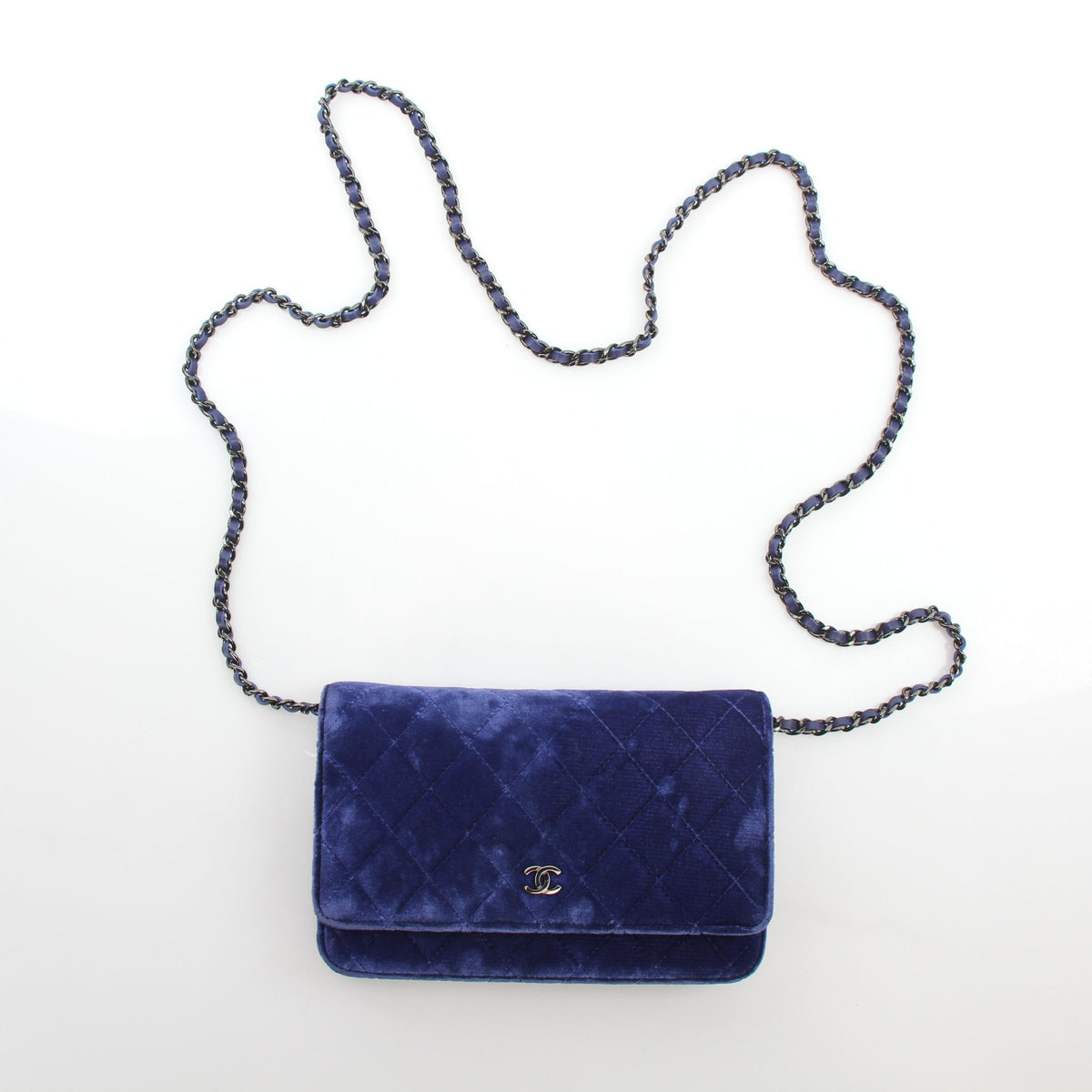 Chanel Classic Velvet Wallet on Chain in blue with gold-tone hardware, featuring quilted velvet design and chain strap.