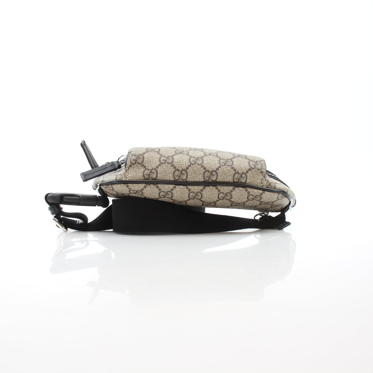 Gucci GG Supreme Monogram large beige and ebony belt bag handbag with black accents and adjustable strap.