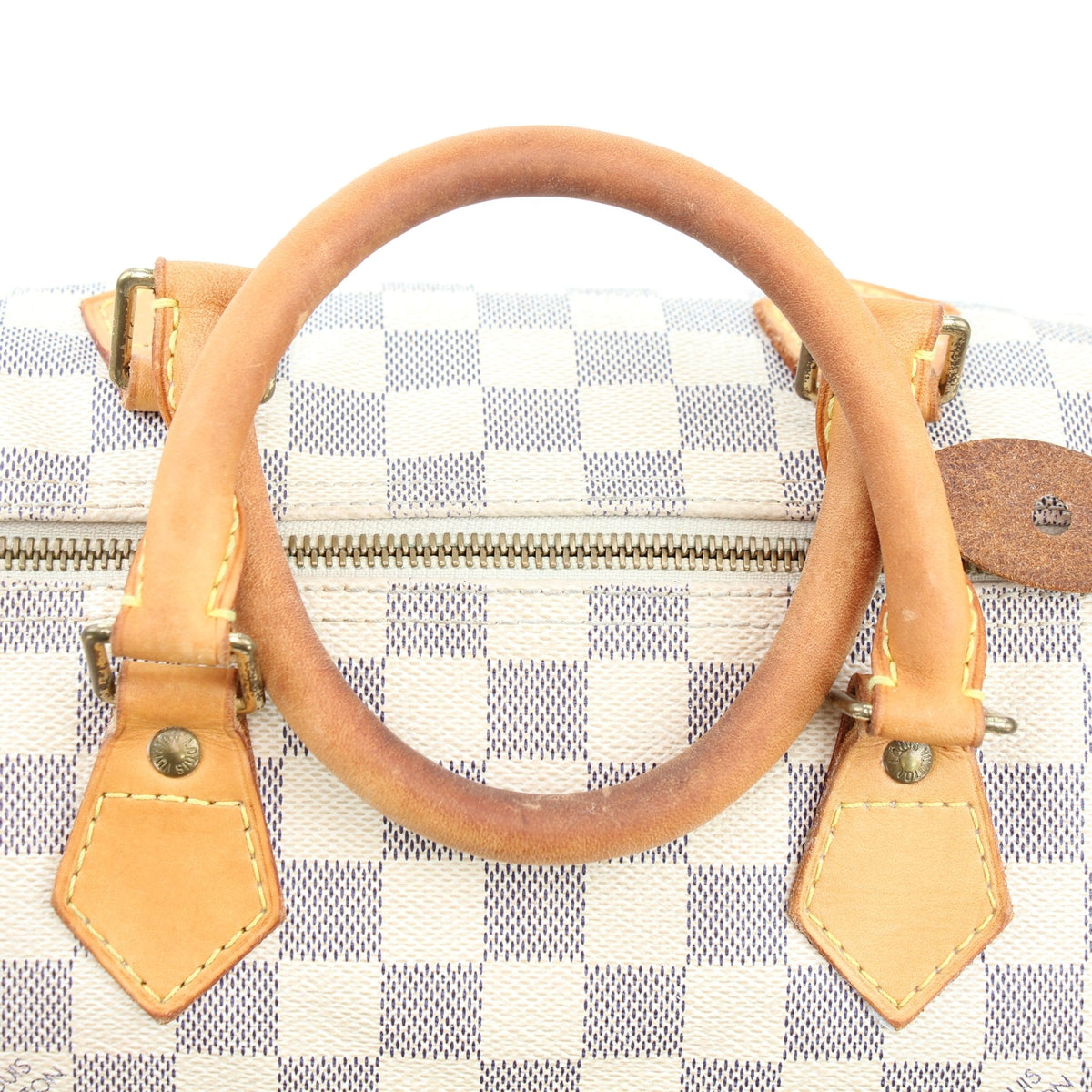 Louis Vuitton Damier Azur Speedy 30 handbag with gold hardware, featuring classic checkerboard pattern and leather handles.