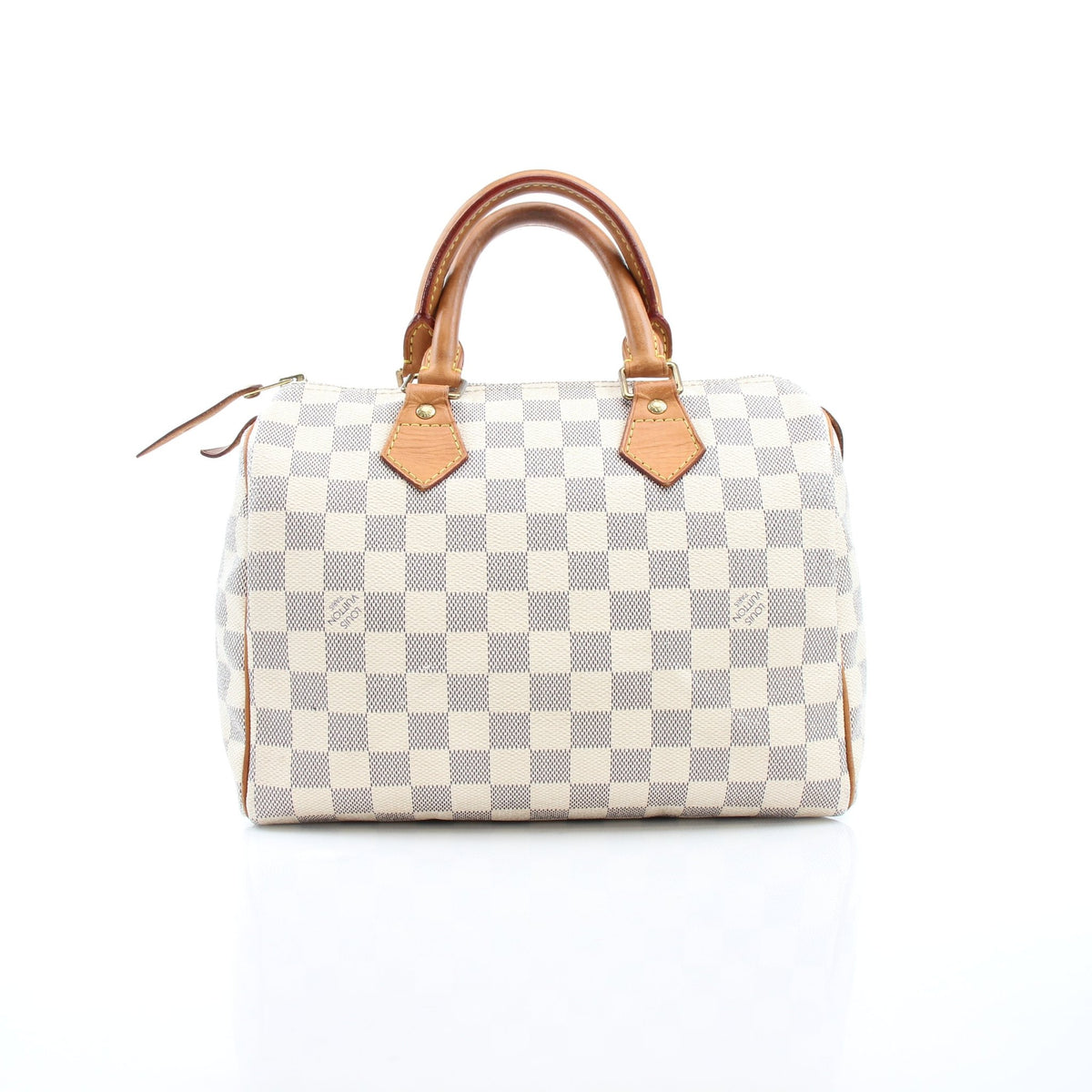 Louis Vuitton Damier Azur Speedy 25 handbag with leather handles and gold hardware, resting on a neutral surface.