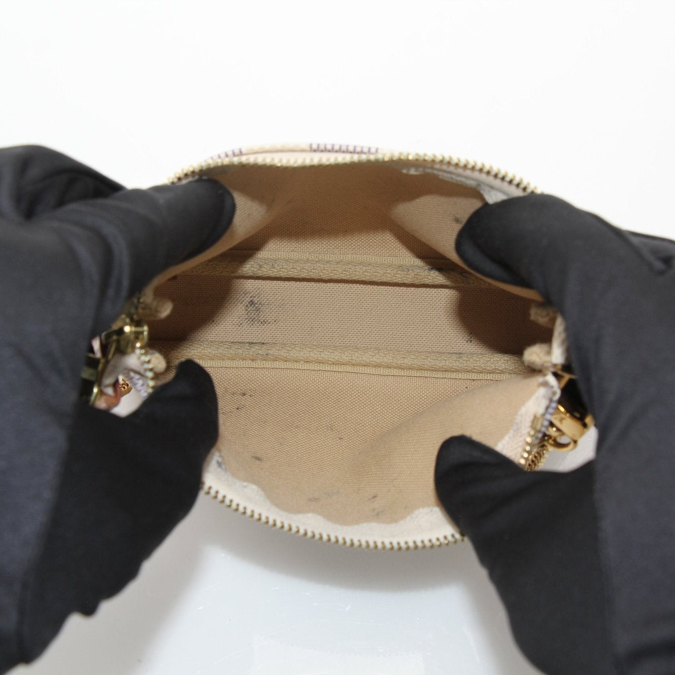 Louis Vuitton Pochette Chain Coin Purse handbag with gold chain and monogram canvas, stylish accessory for coins and small essentials.