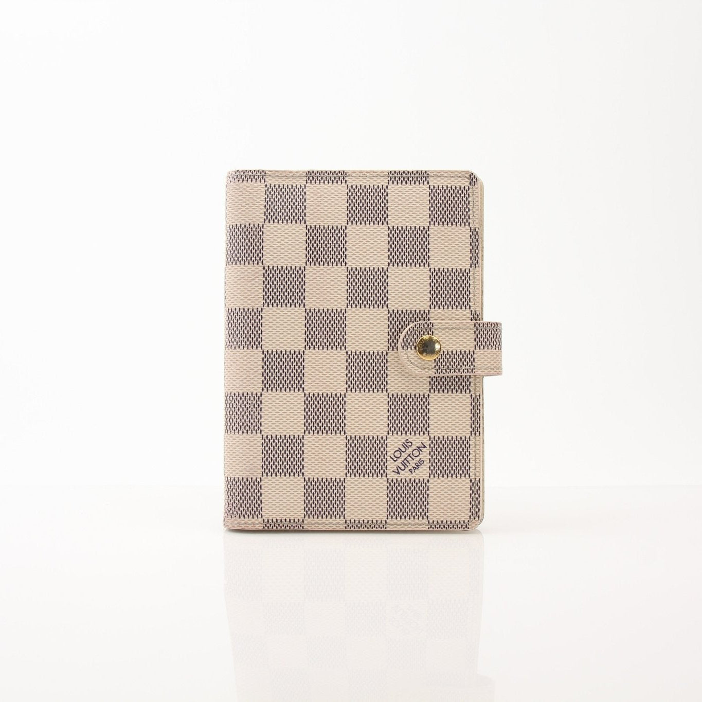Louis Vuitton Damier Azur Agenda PM accessory with gold accents, featuring the signature checkered pattern and compact design.