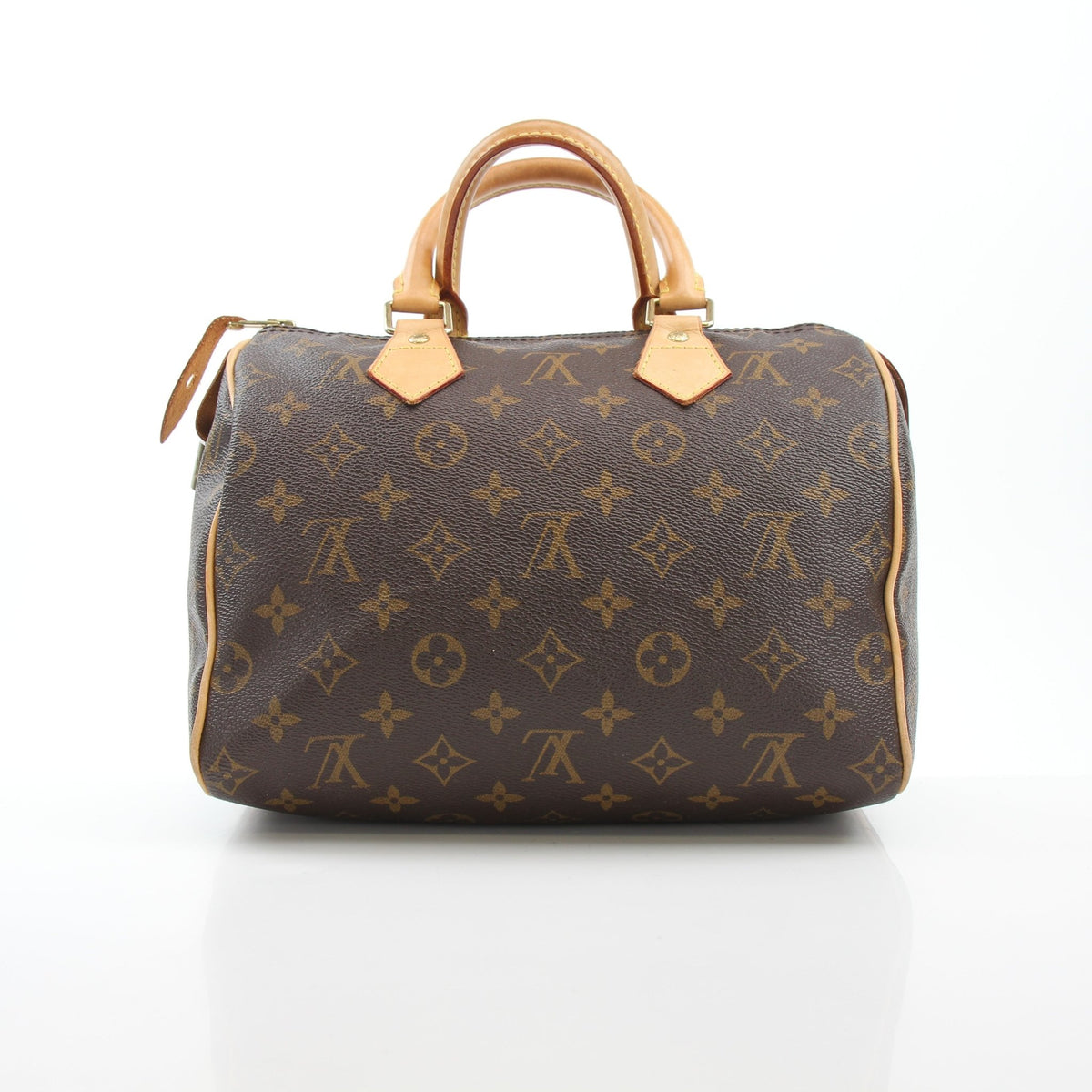 Louis Vuitton Monogram Speedy 25 handbag with gold hardware, featuring the classic monogram pattern and leather handles.