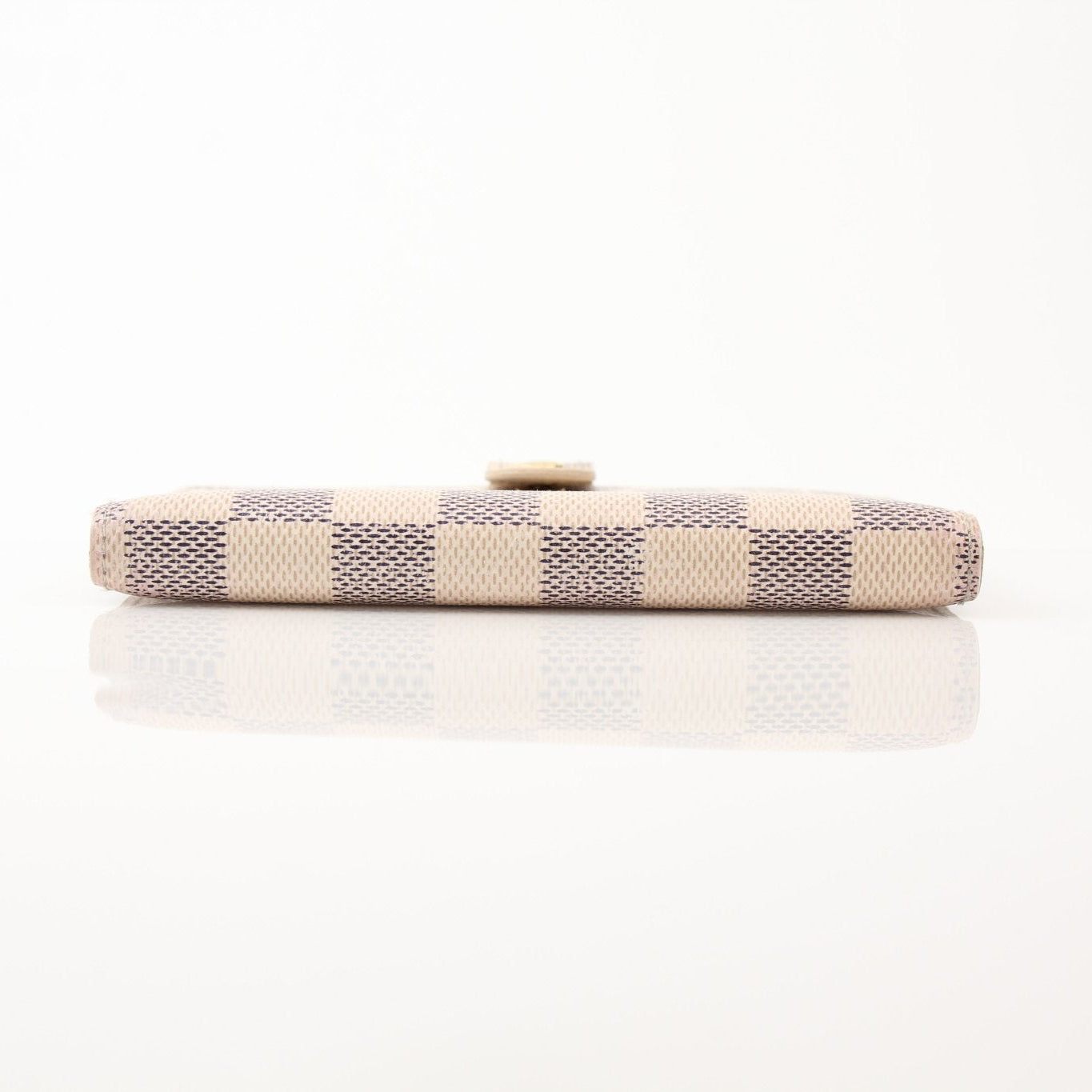Louis Vuitton Damier Azur Agenda PM leather accessories with gold accents, featuring the signature checkered pattern and compact design.