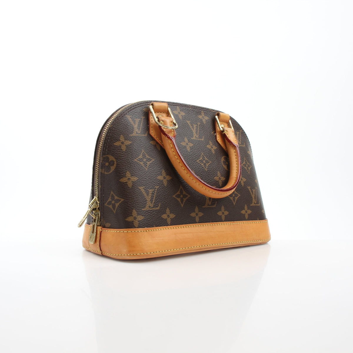 Louis Vuitton brown Alma BB handbag with gold hardware, featuring structured design and top handles, on a plain background.