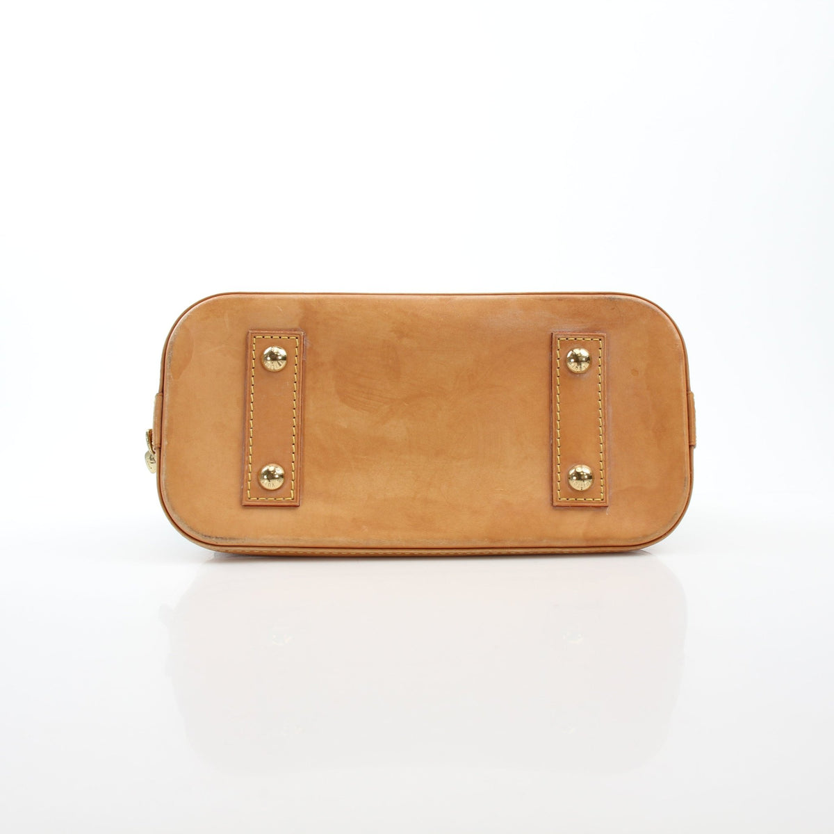 Louis Vuitton brown Alma BB handbag with gold hardware, featuring structured shape and top handles, displayed on a neutral background.