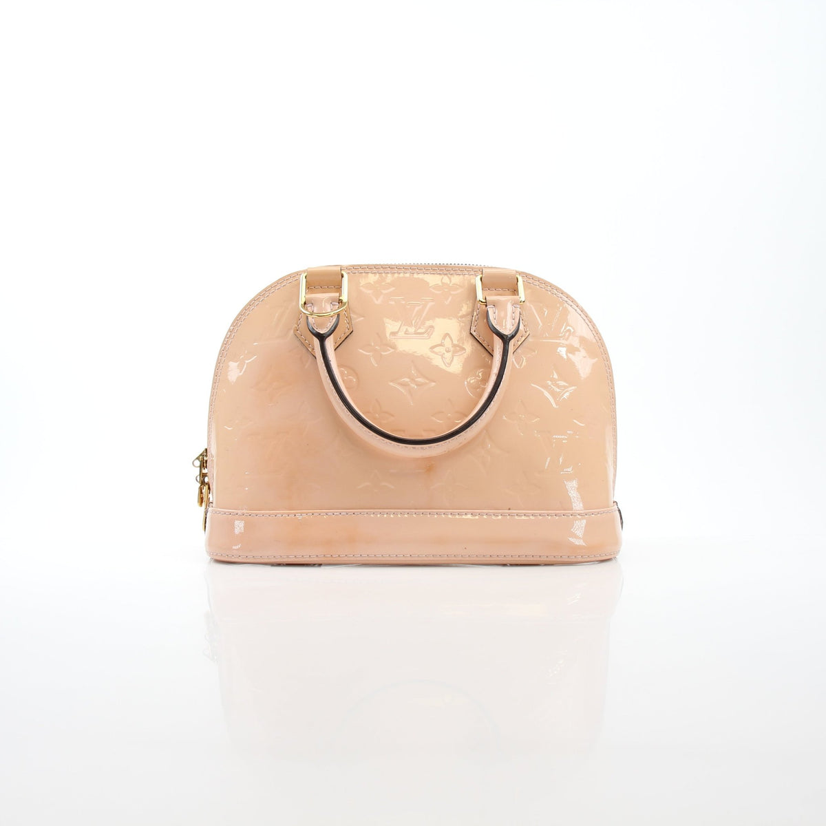Louis Vuitton blush pink Alma BB handbag with gold hardware, featuring structured shape and top handle.