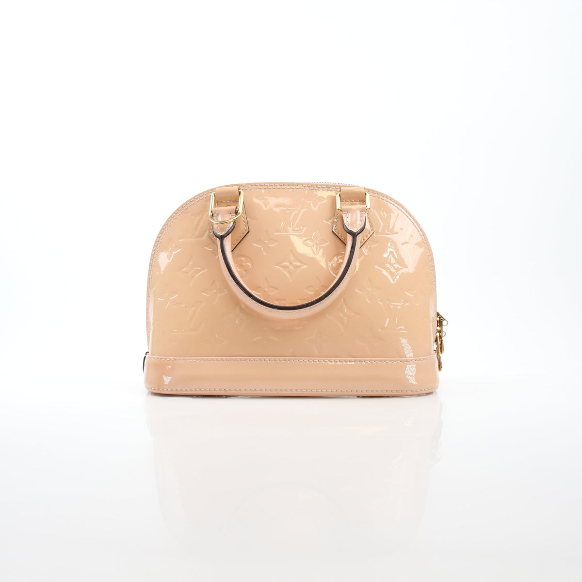 Louis Vuitton Blush Pink Alma BB handbag with gold hardware, featuring structured leather design and top handle.