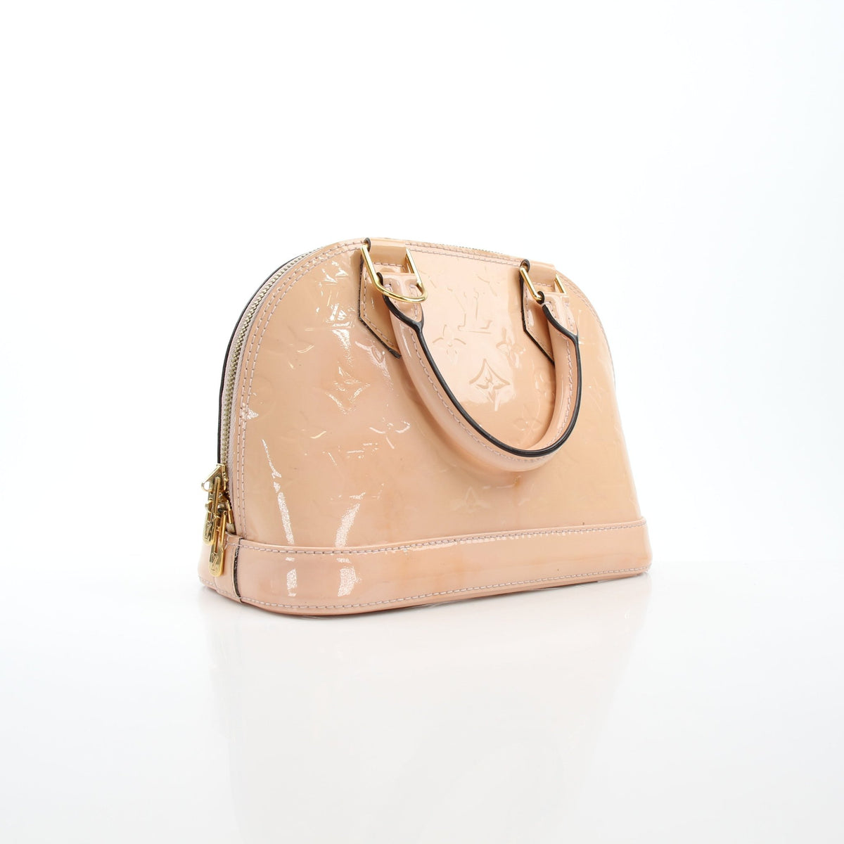 Louis Vuitton Blush Pink Alma BB handbag with gold hardware, featuring structured design and top handles.