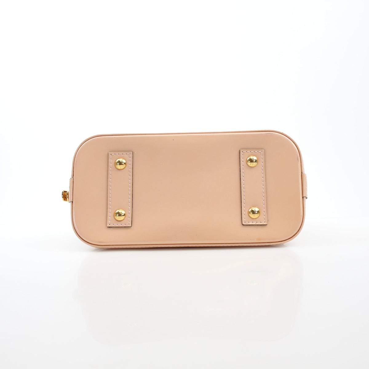 Louis Vuitton Blush Pink Alma BB handbag with gold hardware, structured leather design and top handles.
