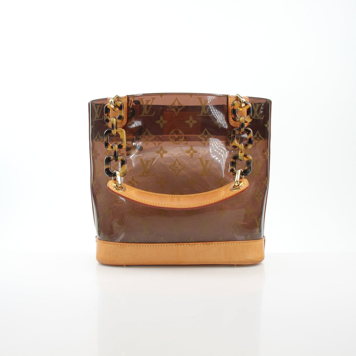 Louis Vuitton Cabas Ambre PM tote handbag with leather handles and spacious interior, displayed on a neutral background