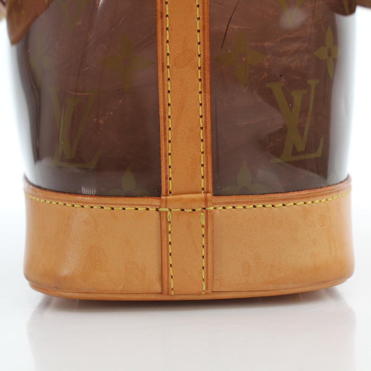 Gold & Beyond Louis Vuitton Cabas Ambre PM tote handbag with beige canvas and leather handles, showcasing its spacious design.
