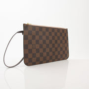 Gold & Beyond Louis Vuitton Pochette Wristlet, a stylish travel bag with leather exterior and wrist strap, perfect for on-the-go use.
