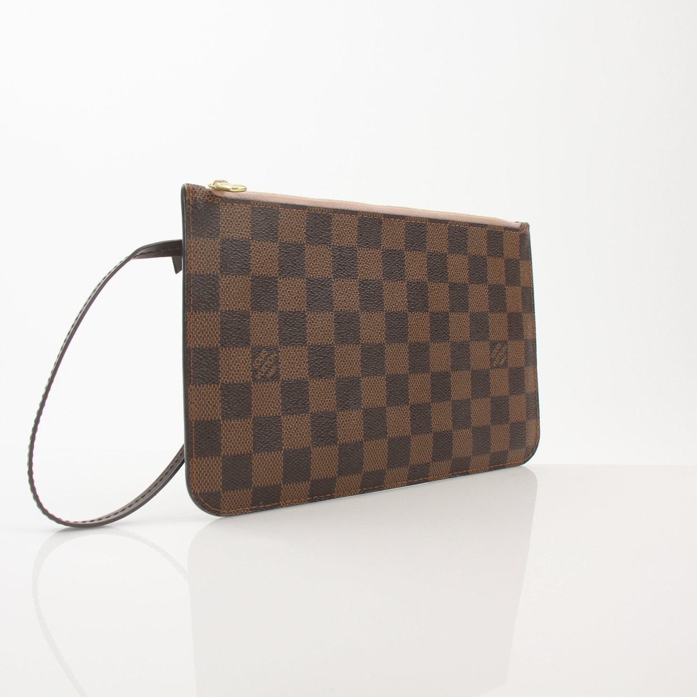 Gold & Beyond Louis Vuitton Pochette Wristlet, a stylish travel bag with leather exterior and wrist strap, perfect for on-the-go use.