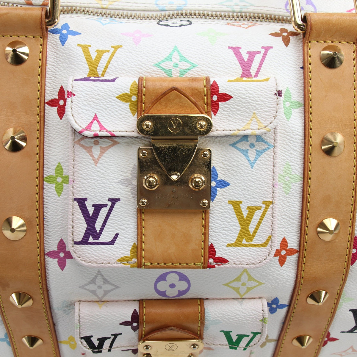 Louis Vuitton x Takashi Murakami Keepall 45 travel bag with colorful floral design, durable canvas, and leather trim.