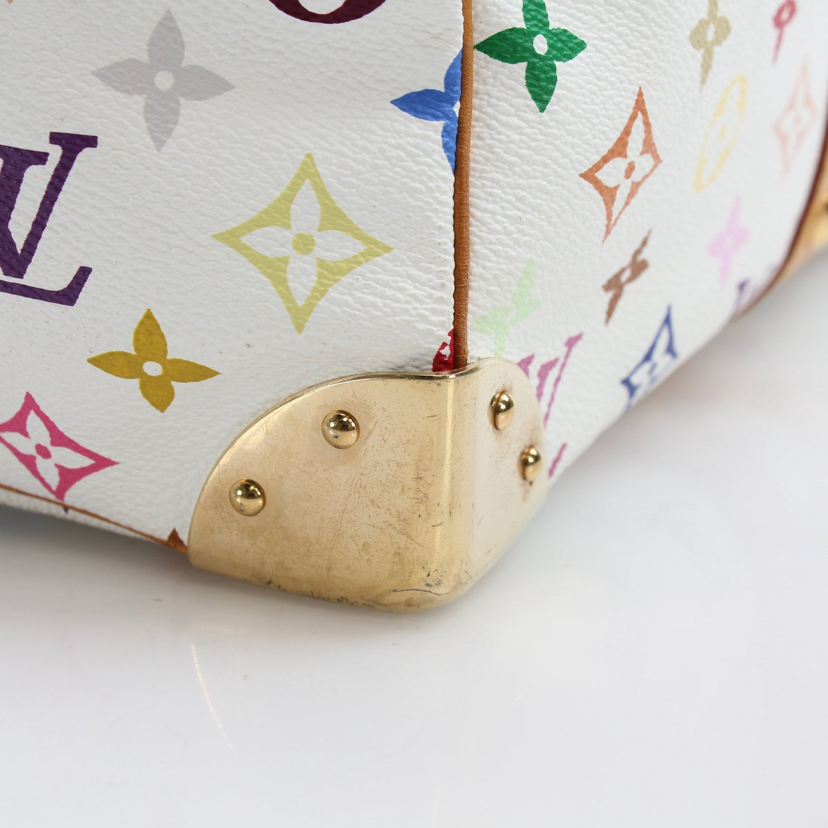Louis Vuitton x Takashi Murakami Keepall 45 travel bag in vibrant monogram canvas with colorful floral designs.