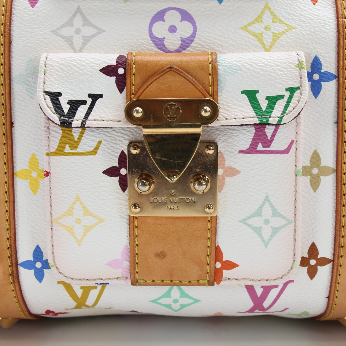 Louis Vuitton x Takashi Murakami Keepall 45 travel bag with colorful floral pattern and monogram canvas, displayed on a light background.