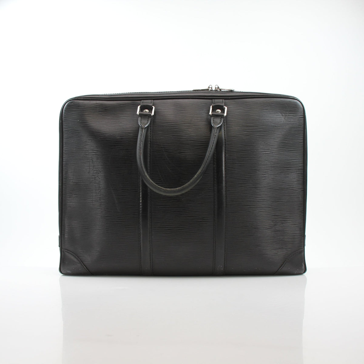 Louis Vuitton Black Porte-Documents Voyage MM briefcase, luxury handbag with structured design and top handle, showing front view.