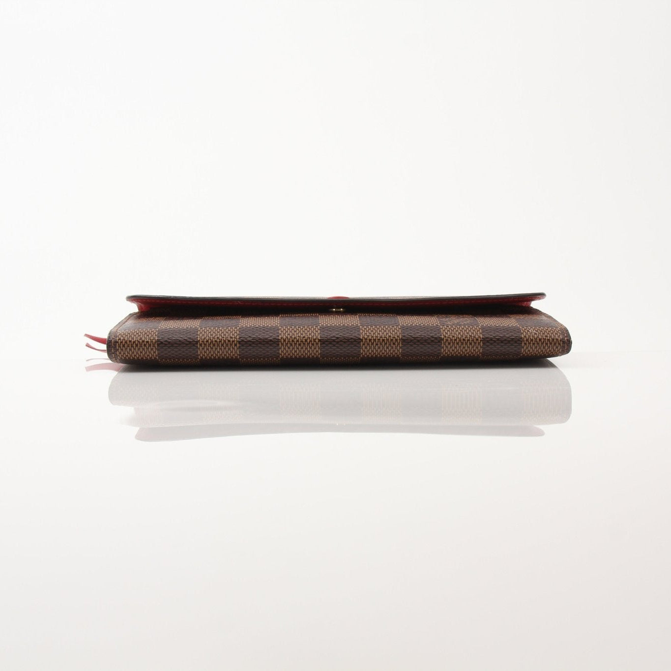 Louis Vuitton Emilie Wallet by Gold & Beyond, showcasing sleek leather design and gold accents with multiple card slots.
