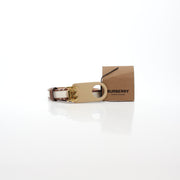 Burberry natural canvas and brown leather TB belt showing the adjustable strap and classic design.