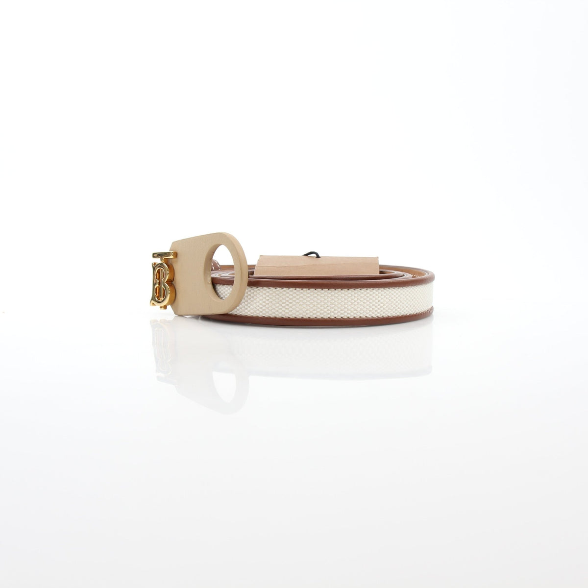 Gold & Beyond Burberry natural canvas and brown leather TB belt, showcasing the sleek belt with branded buckle and detailed stitching.