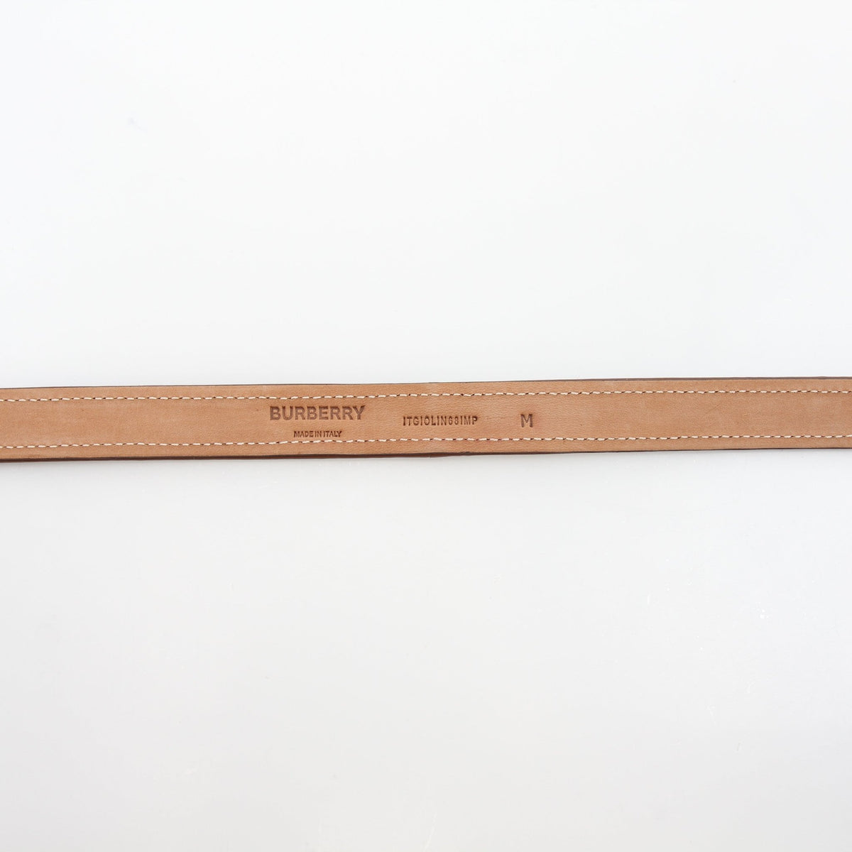 Burberry natural canvas and brown leather TB belt, accessory with adjustable strap and metal buckle, displayed on a neutral background.