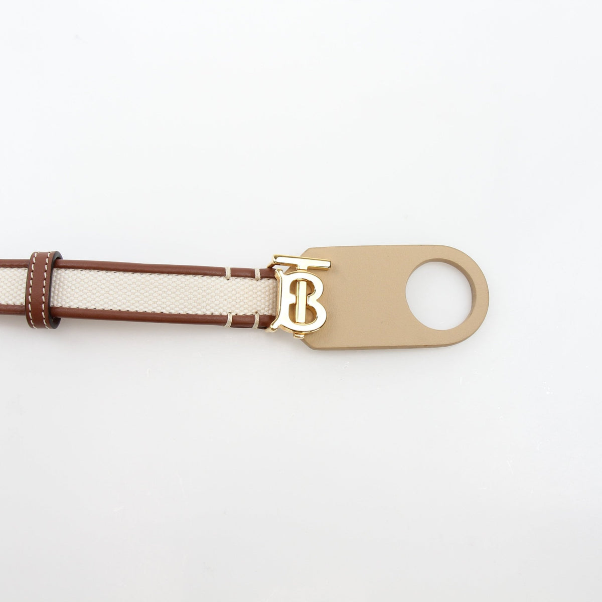 Burberry natural canvas and brown leather TB belt, accessory with gold buckle, featuring signature monogram pattern and stylish design.