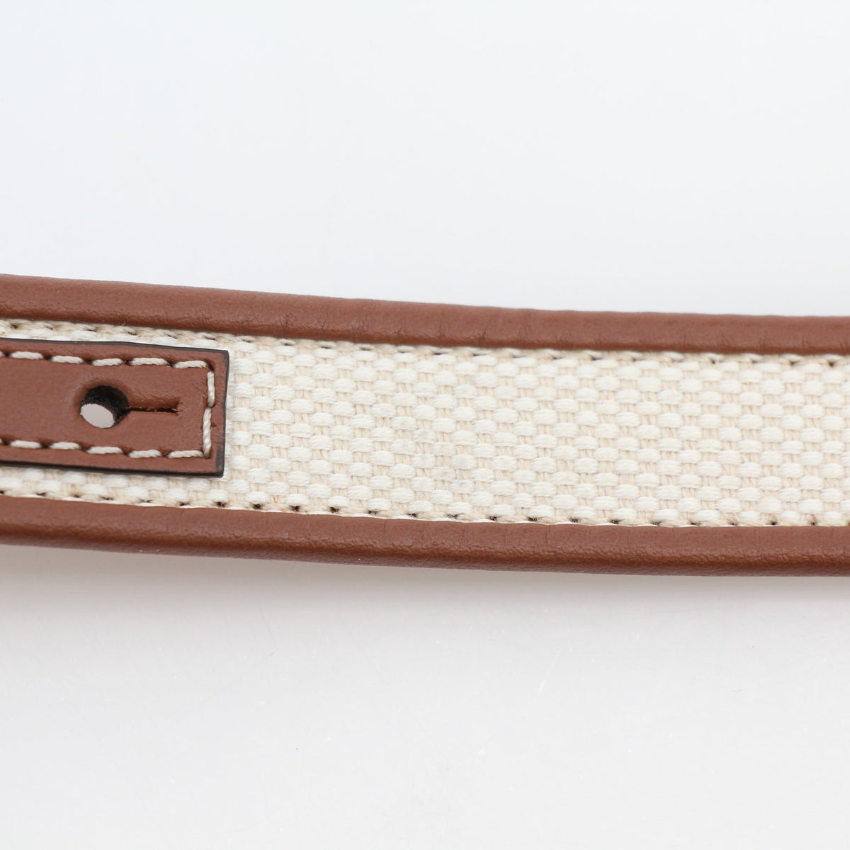 Burberry natural canvas and brown leather TB belt, stylish accessories with gold accents, detailed close-up image.