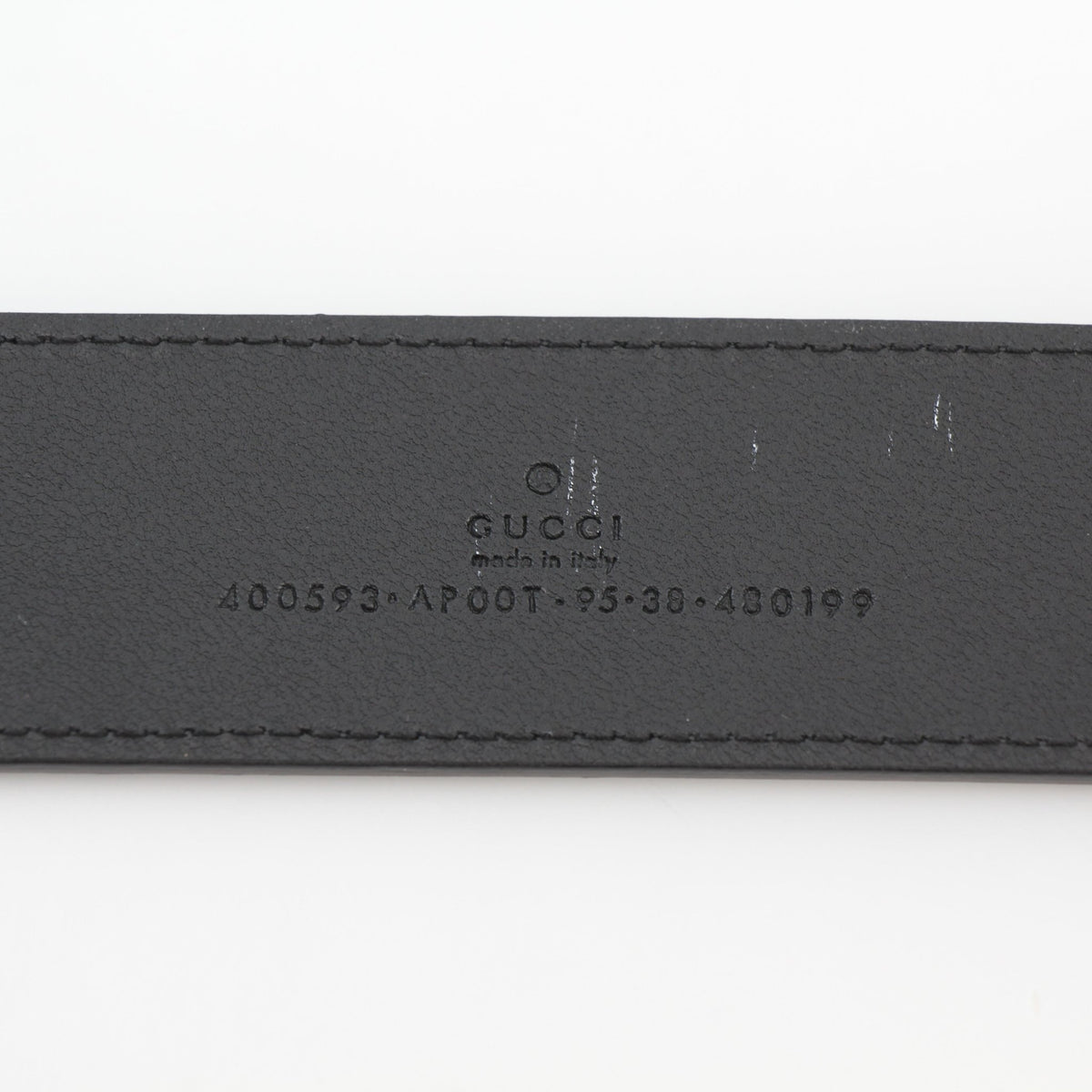 Black Gucci GG Marmont wide leather belt with gold-toned buckle, stylish accessory for fashion-forward outfits.