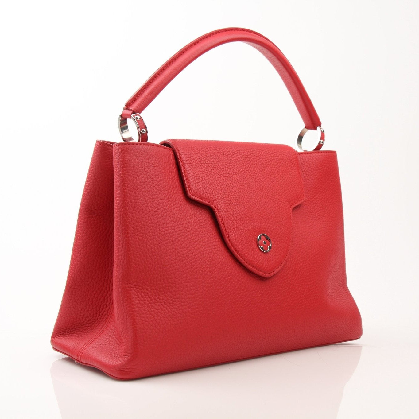 Louis Vuitton Capucines MM handbag in leather with gold hardware, featuring top handles and a structured design.