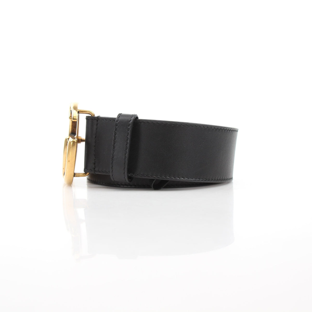 Black leather Gucci GG Marmont wide belt with gold-toned hardware and double G logo buckle, stylish accessory for outfits.