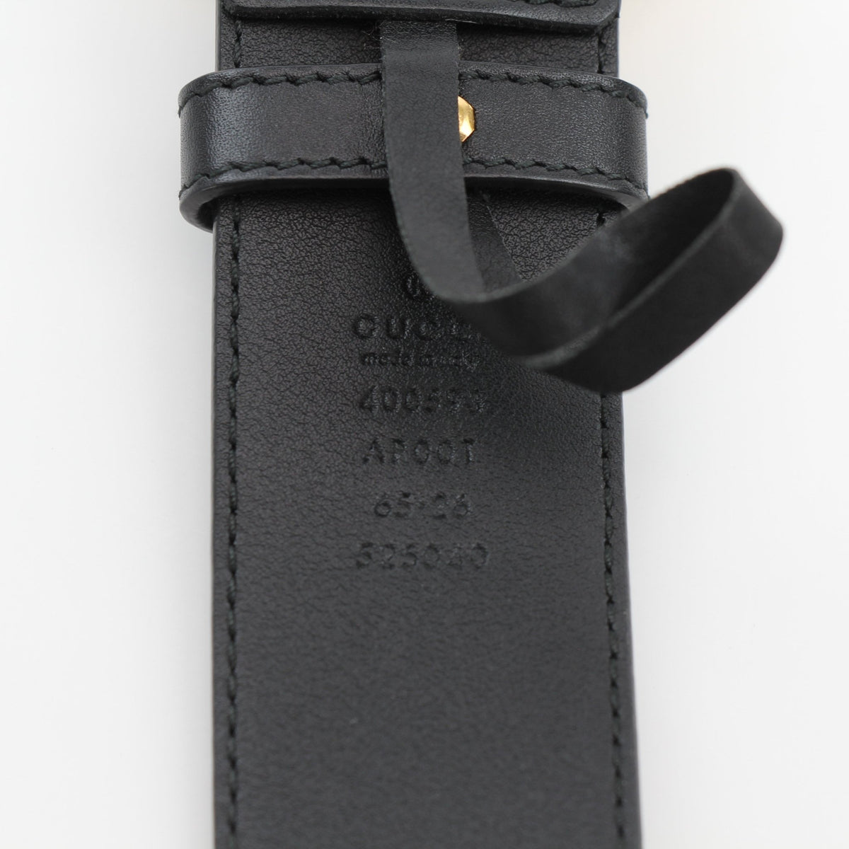 Gucci GG Marmont wide belt in black leather with gold hardware, stylish accessory for fashionable outfits.