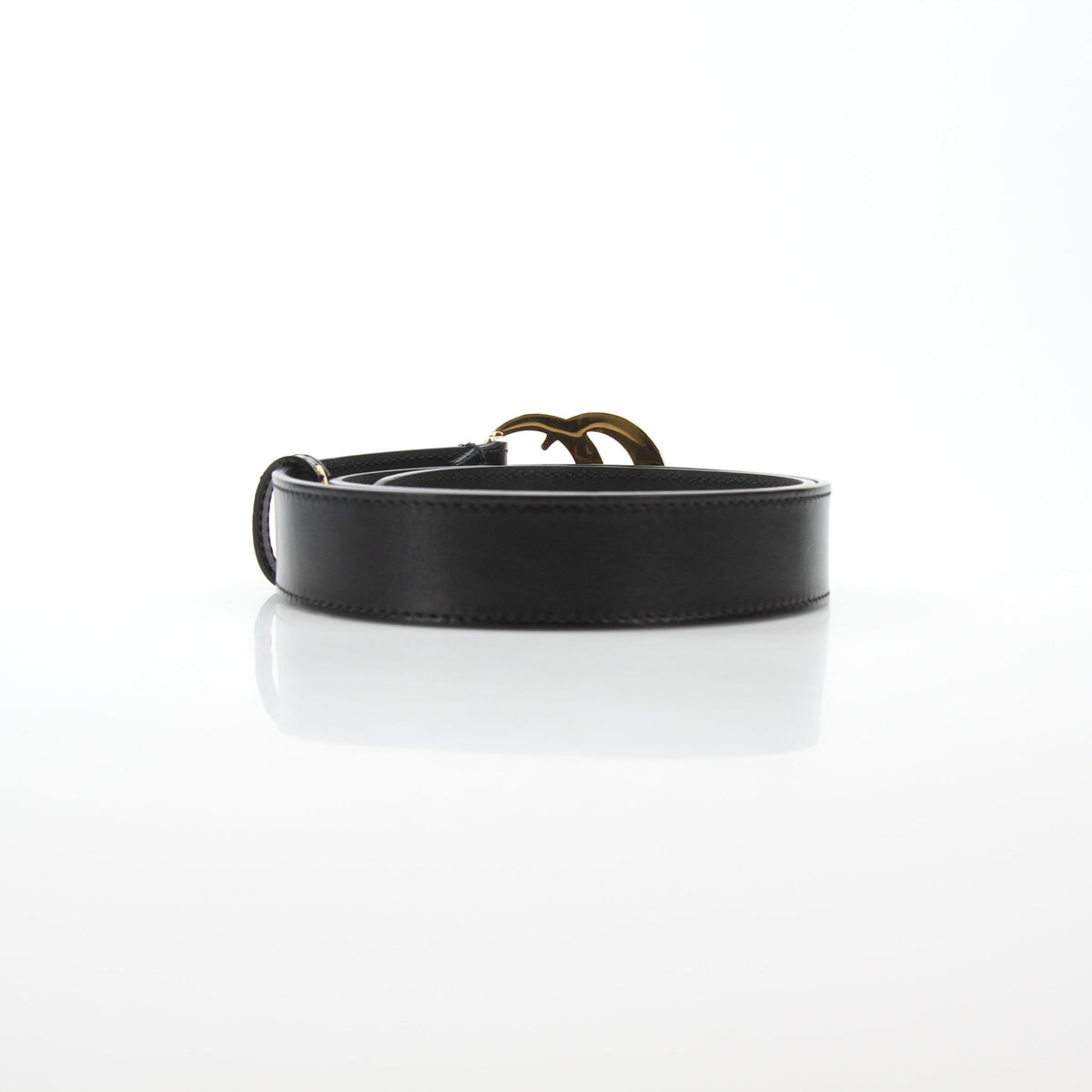 Black leather Gucci GG Marmont thin belt with gold-tone hardware, stylish accessory for women's fashion.