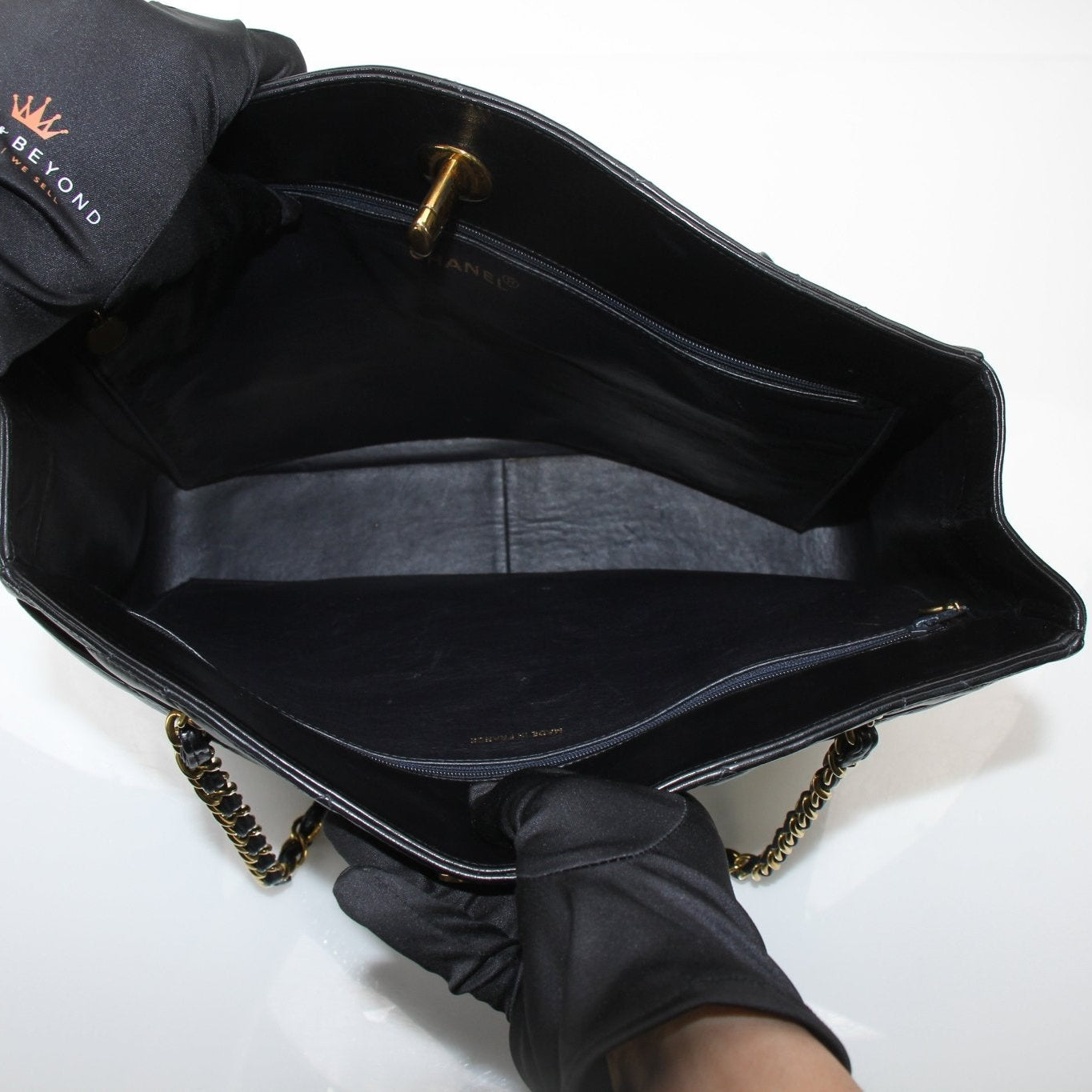 Gold & Beyond Chanel Black Metalasse Lambskin 2-Way Shoulder Bag, elegant handbag with metal accents and sleek design.