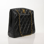 Chanel black metalasse lambskin 2-way shoulder handbag with gold hardware, featuring a sleek, luxurious design and versatile style.