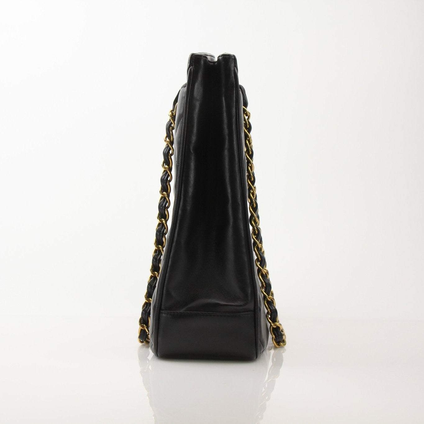 Chanel black Metalasse lambskin 2-way shoulder handbag with silver hardware, elegant design, and structured shape.