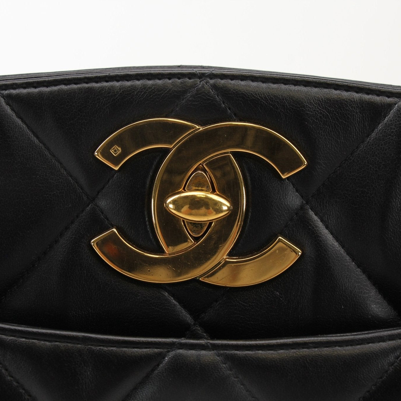 Chanel Black Metalasse Lambskin 2-Way Shoulder Bag viewed from front, showcasing sleek design and gold hardware details.