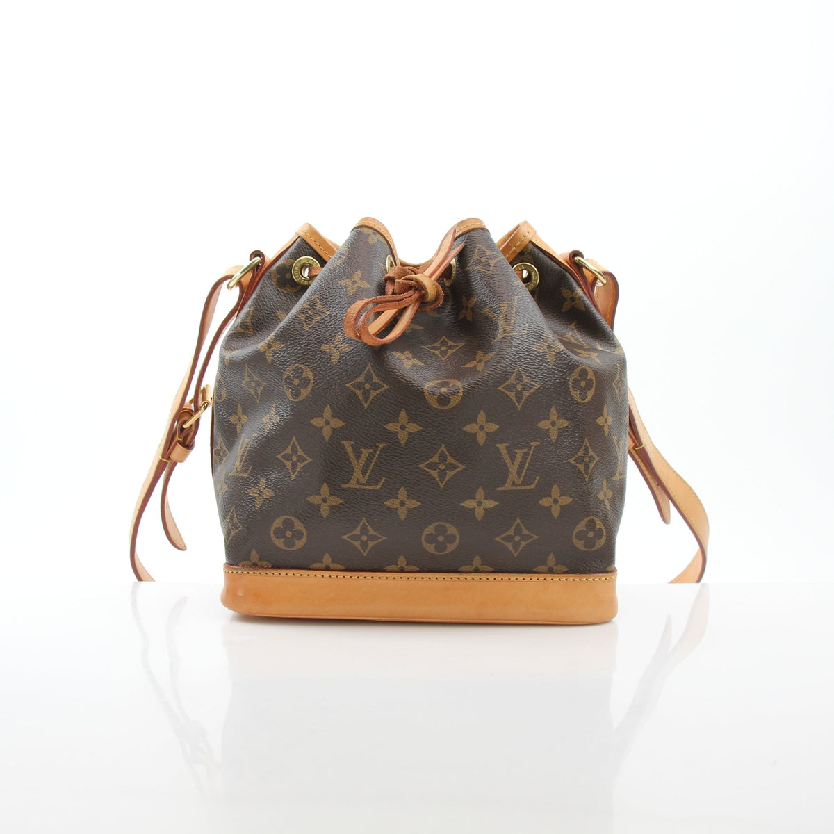 Louis Vuitton Noé BB Monogram Bucket Bag handbag with gold-tone hardware and adjustable leather strap, displayed against a neutral background.