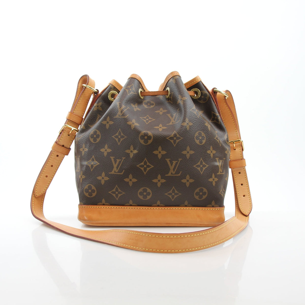 Louis Vuitton Noé BB Monogram Bucket Handbag with gold hardware and adjustable shoulder strap, featuring signature LV monogram canvas.