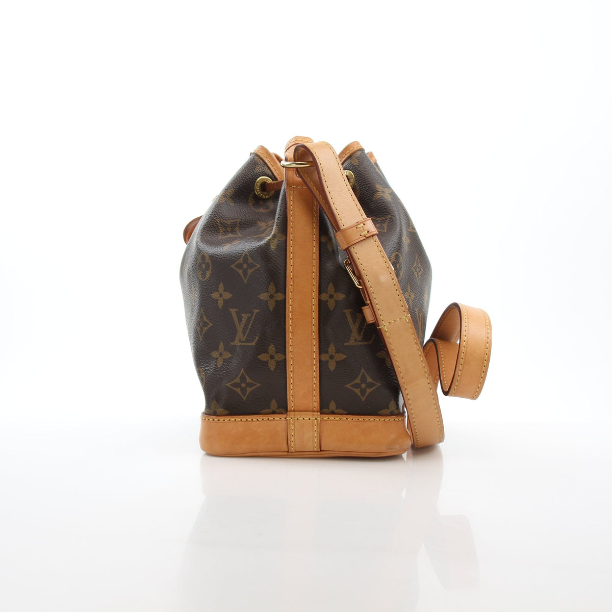 Louis Vuitton Noé BB Monogram bucket handbag featuring gold-tone hardware and adjustable leather strap.